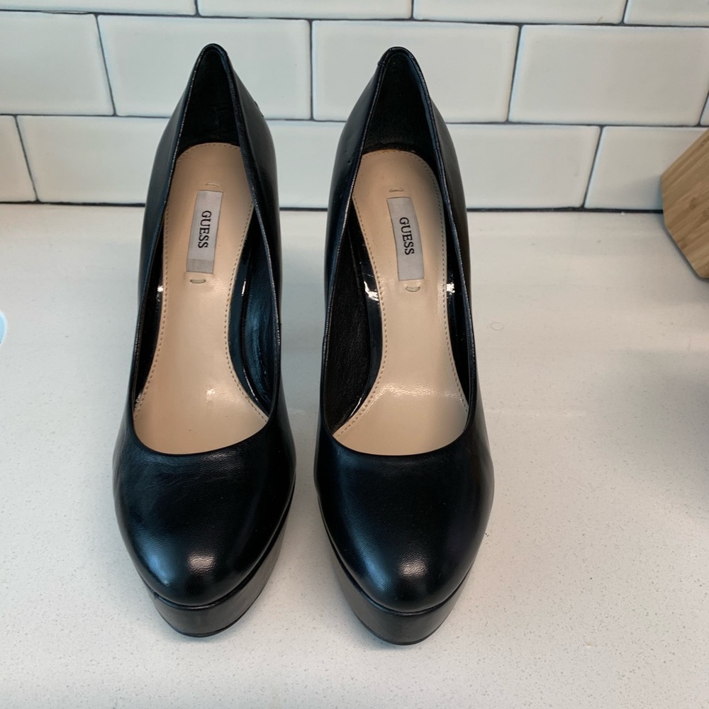 Guess black platform pumps. Never worn.